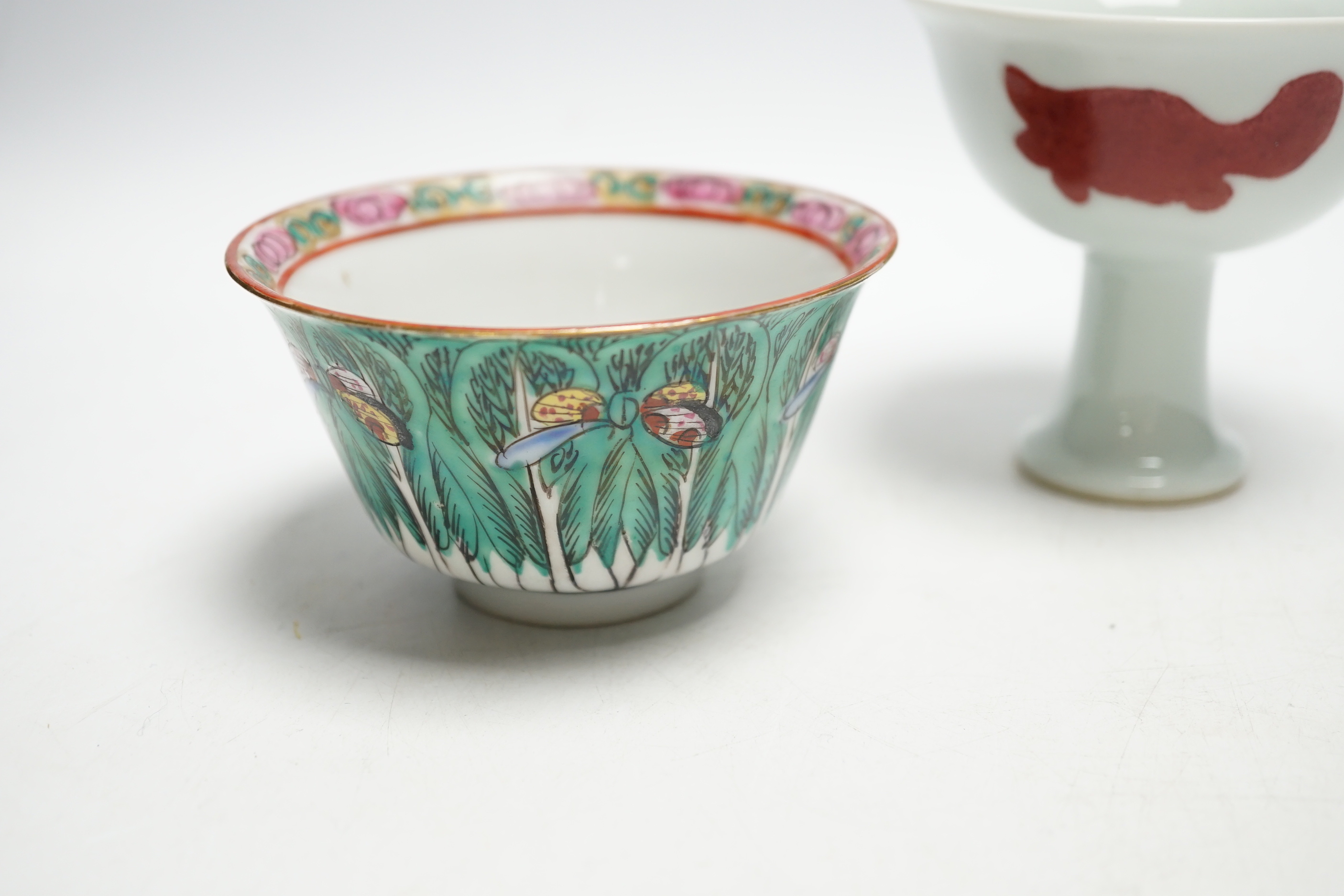 A Chinese tea bowl and stand, a white glazed horse and a pedestal bowl, tallest 9cm high